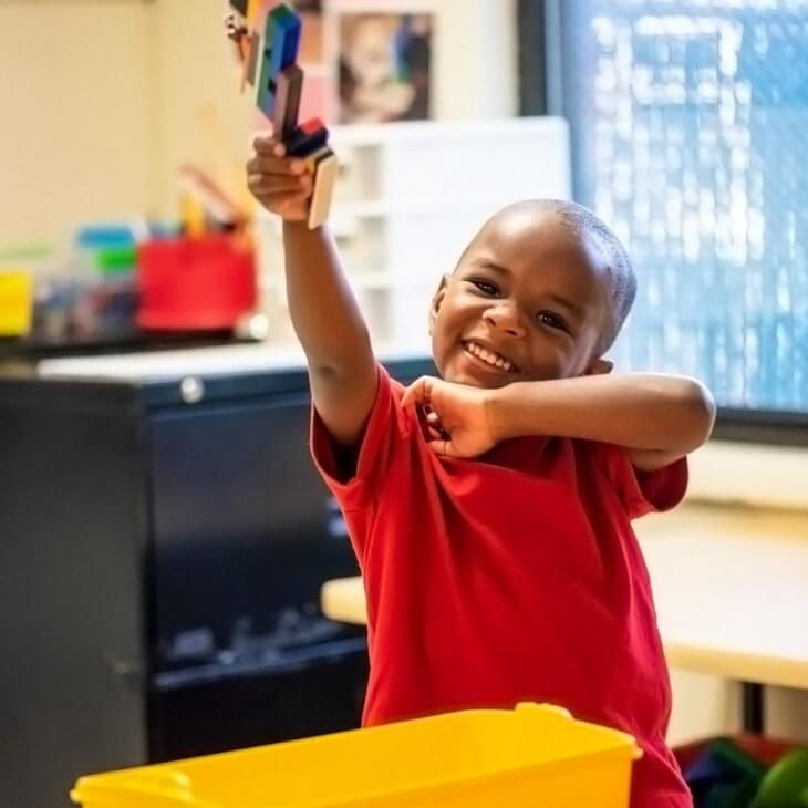 A young boy in a classroom at Yulee Kindercare
