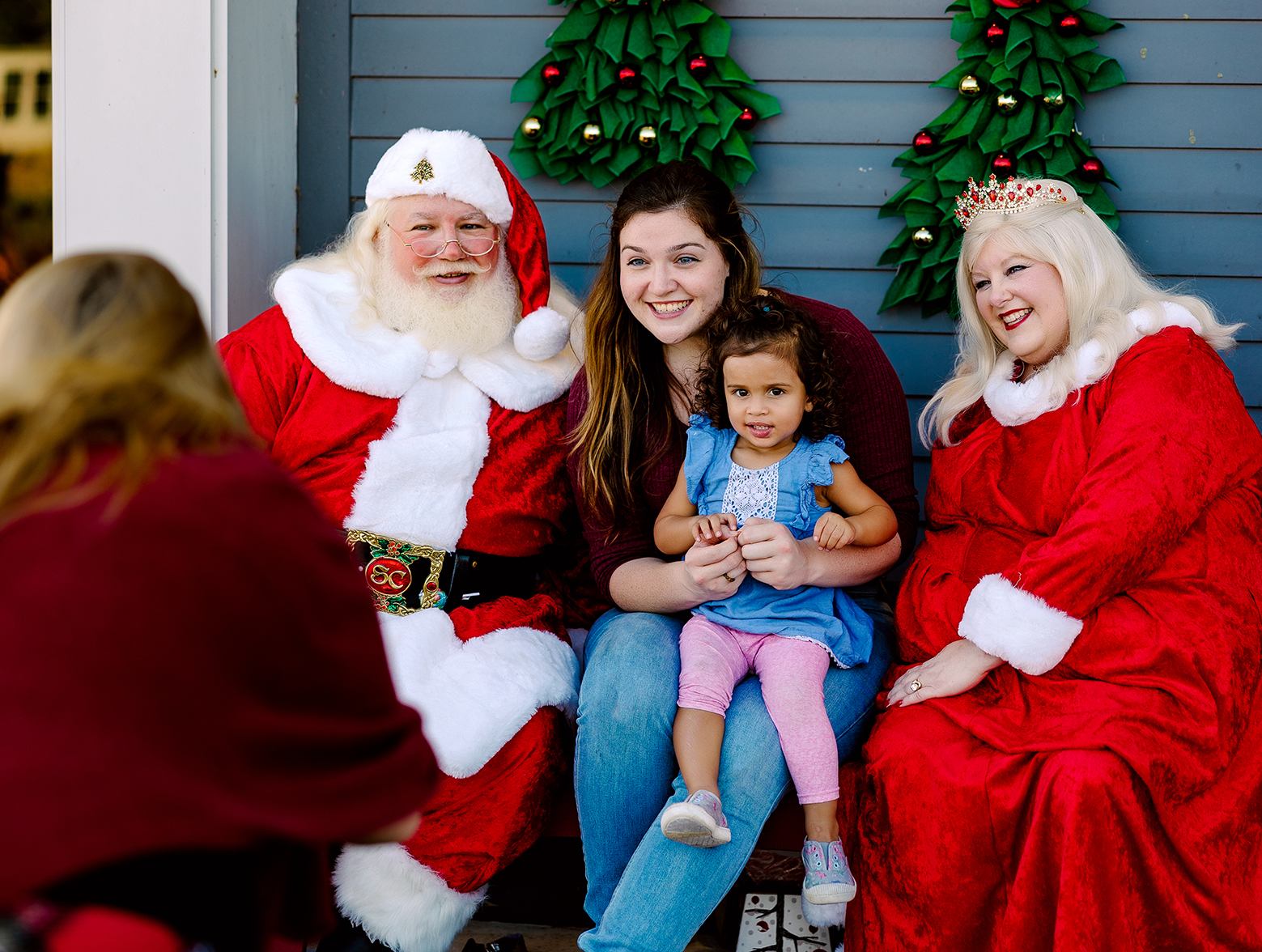Family poses with Santa at Winterfest.