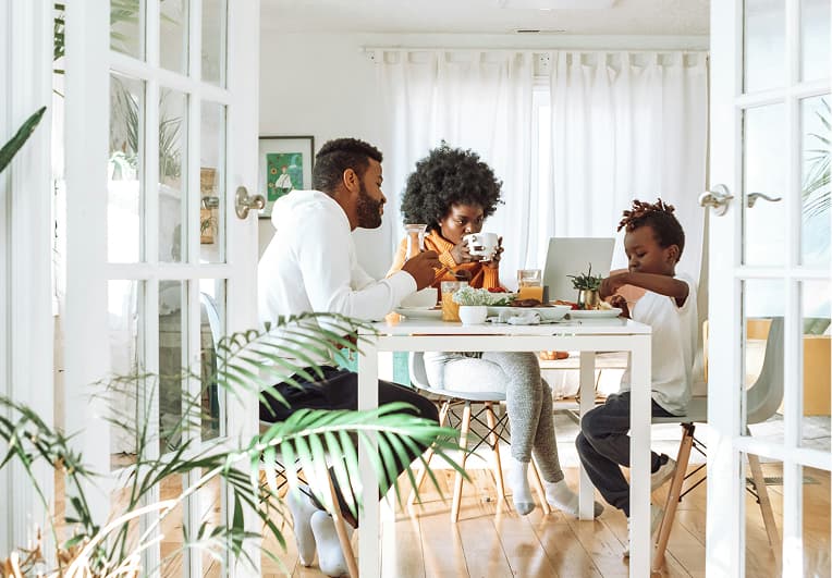 A family having breakfast at the table