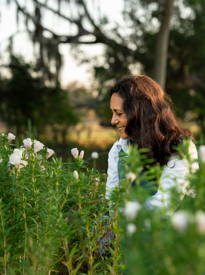 Woman looking at wildflowers