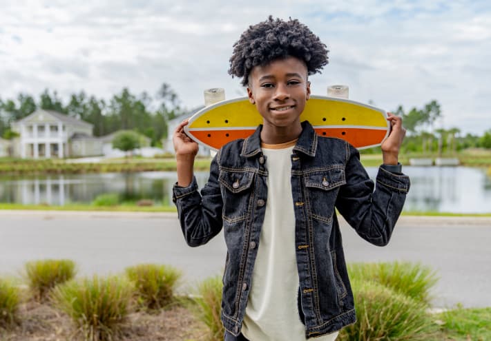Young boy with skateboard