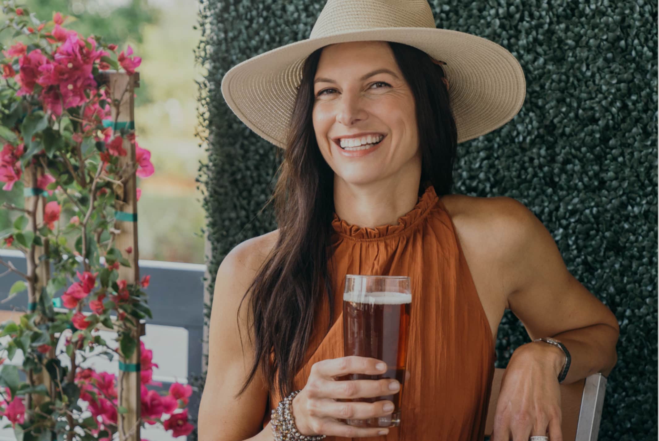 Woman having drink at outdoor cafe
