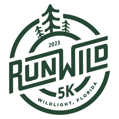 Green circular logo with pine trees and bold text: "2023 Run Wild 5K Wildlight, Florida"—celebrating the vibrant spirit of the Wildlight master planned community and the natural beauty surrounding homes in Nassau County, Florida.