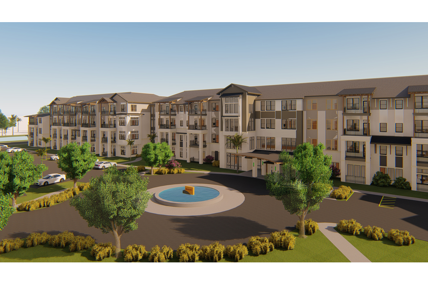 A four-story modern apartment building with balconies, a circular driveway, a small fountain in front, landscaped bushes, and parked cars under a clear sky—a standout feature within the Wildlight Yulee Florida community.