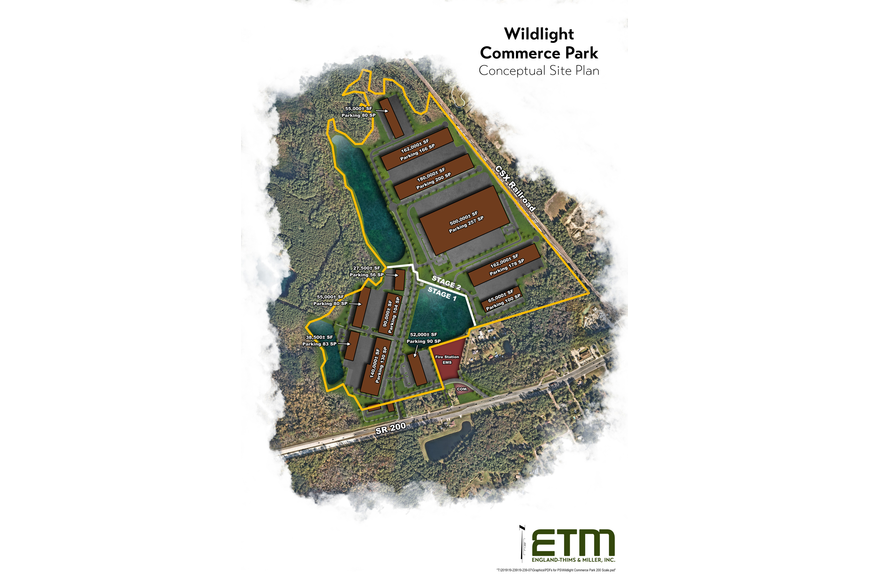 A conceptual site plan for Wildlight Commerce Park within the Wildlight master planned community shows labeled site sections, roadways, water features, and surrounding wooded areas, with the ETM logo at the bottom.