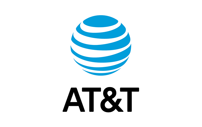 AT&T logo featuring a blue and white striped globe above bold black letters spelling "AT&T" on a white background, as seen in the Wildlight Yulee Florida community.