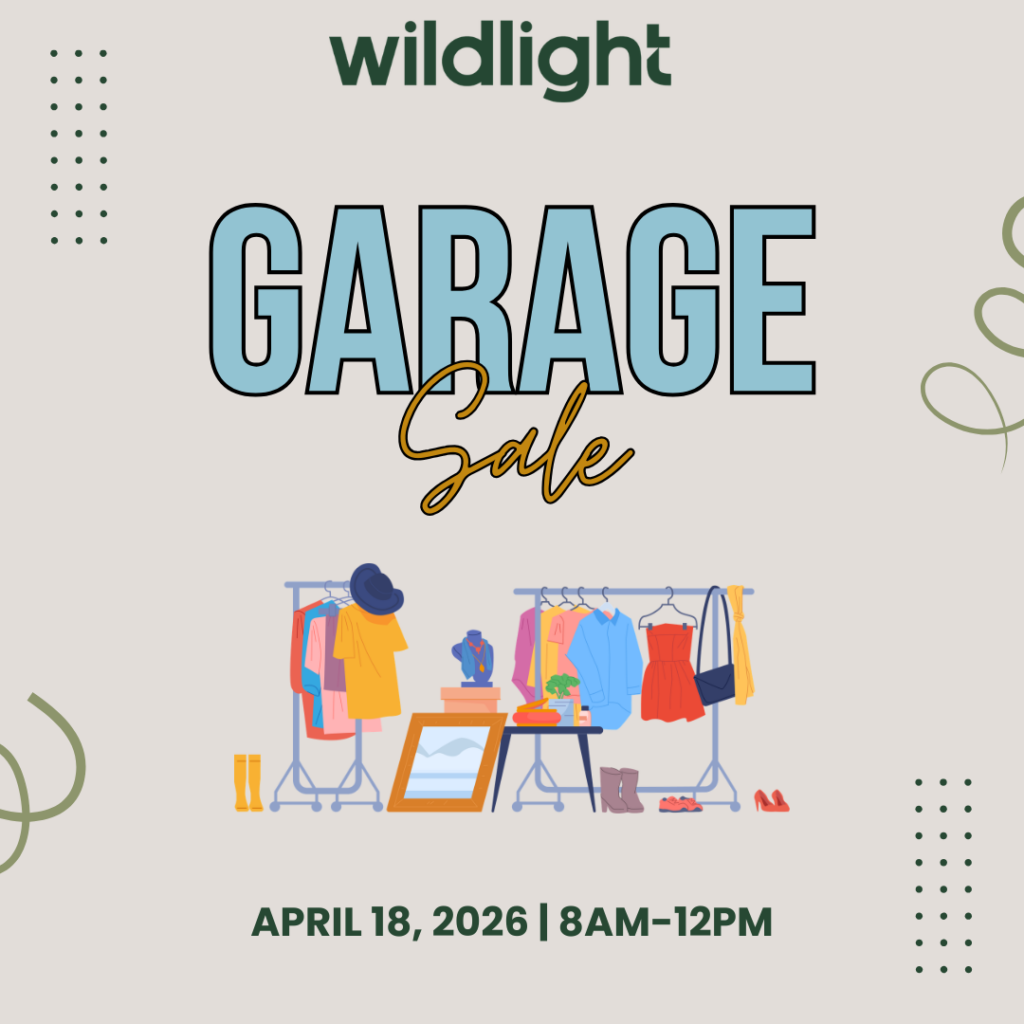 Garage sale event flyer with racks of clothes and accessories, hosted by Wildlight, in the heart of the Wildlight Florida community, scheduled for April 18, 2026, from 8 AM to 12 PM.