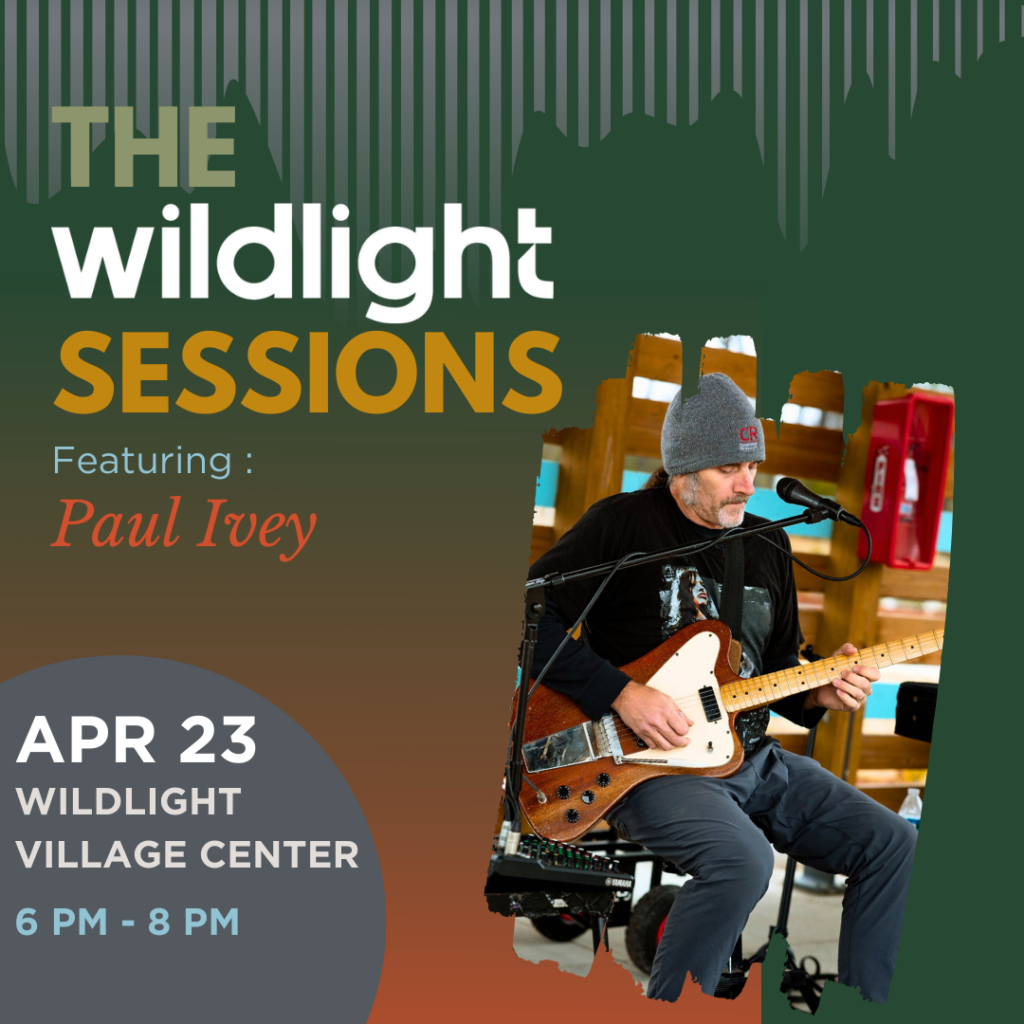 A man plays an electric guitar and sings into a microphone. Text promotes The Wildlight Sessions featuring Paul Ivey on April 23, 6–8 PM at Wildlight Village Center—discover music and new homes in Wildlight FL.